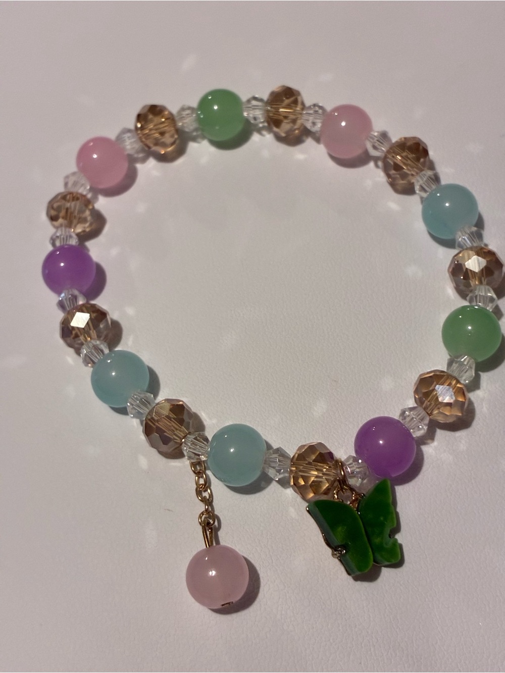 Pastel Bead Stretch Bracelet with Green Butterfly Charm New Without Tags